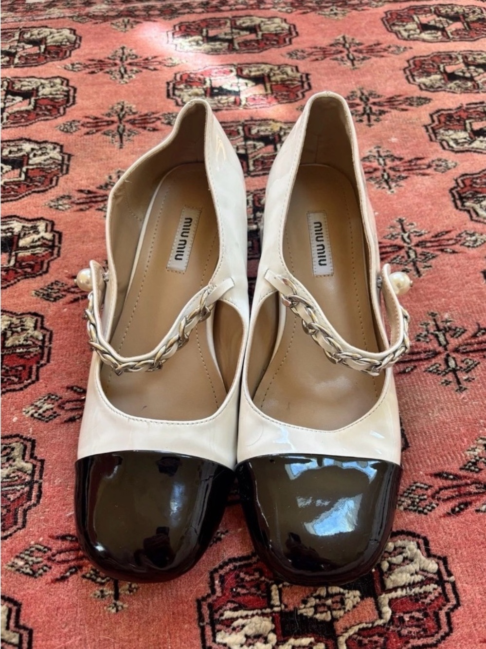 Miu Miu Two-Tone Patent Leather Mary Jane Pumps in Cream and Black